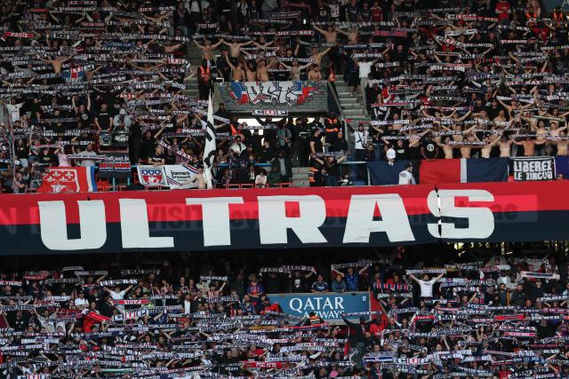 A banner of Ultras Paris group of Paris Saint-Germain's supporters is displayed during the French L1 football match between Paris Saint-Germain (PSG) and FC Nantes at the Parc des Princes stadium in Paris on April 22, 2026. (Photo by FRANCK FIFE / AFP)