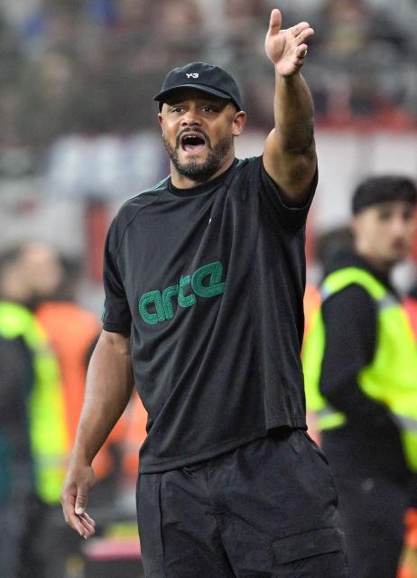 Bayern Munich's Belgian head coach Vincent Kompany reacts from the sidelines during the German Cup (DFB-Pokal) semi-final football match between Bayer 04 Leverkusen and FC Bayern Munich in Leverkusen, western Germany on April 22, 2026. (Photo by INA FASSBENDER / AFP) / DFB REGULATIONS PROHIBIT ANY USE OF PHOTOGRAPHS AS IMAGE SEQUENCES AND QUASI-VIDEO.