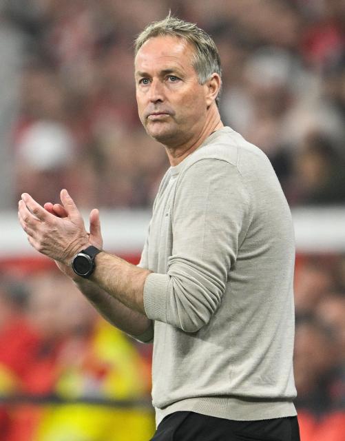 Bayer Leverkusen's Danish head coach Kasper Hjulmand reacts from the sidelines during the German Cup (DFB-Pokal) semi-final football match between Bayer 04 Leverkusen and FC Bayern Munich in Leverkusen, western Germany on April 22, 2026. (Photo by INA FASSBENDER / AFP) / DFB REGULATIONS PROHIBIT ANY USE OF PHOTOGRAPHS AS IMAGE SEQUENCES AND QUASI-VIDEO.