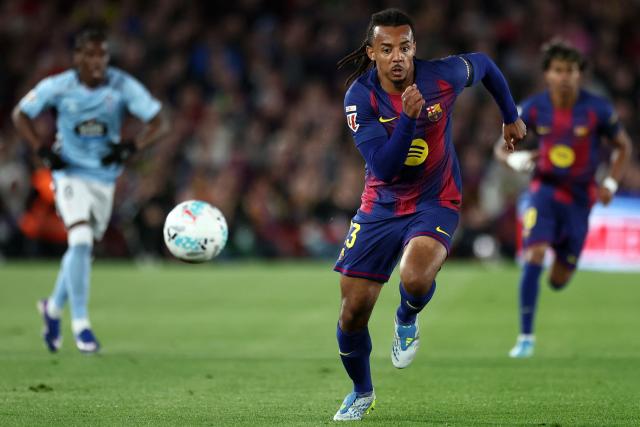 Barcelona's French defender #23 Jules Kounde runs for the ball during the Spanish league football match between FC Barcelona and RC Celta de Vigo at Camp Nou stadium in Barcelona on April 22 , 2026. (Photo by Josep LAGO / AFP)