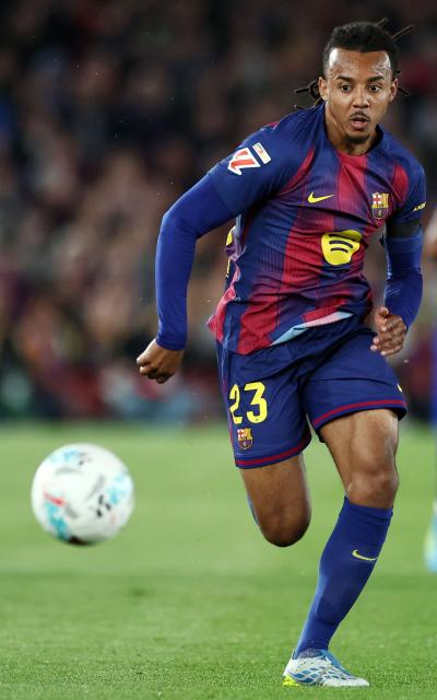Barcelona's French defender #23 Jules Kounde runs for the ball during the Spanish league football match between FC Barcelona and RC Celta de Vigo at Camp Nou stadium in Barcelona on April 22 , 2026. (Photo by Josep LAGO / AFP)