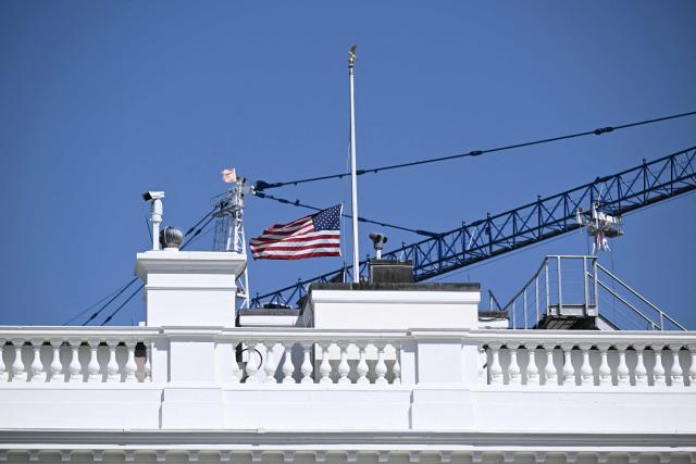 The flag over the White House flies at half staff after the death of US Representative David Scott, Democrat from Georgia, on April 22, 2026 in Washington, DC. (Photo by Brendan SMIALOWSKI / AFP)