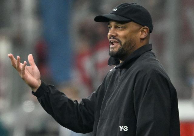 Bayern Munich's Belgian head coach Vincent Kompany reacts from the sidelines during the German Cup (DFB-Pokal) semi-final football match between Bayer 04 Leverkusen and FC Bayern Munich in Leverkusen, western Germany on April 22, 2026. (Photo by INA FASSBENDER / AFP) / DFB REGULATIONS PROHIBIT ANY USE OF PHOTOGRAPHS AS IMAGE SEQUENCES AND QUASI-VIDEO.