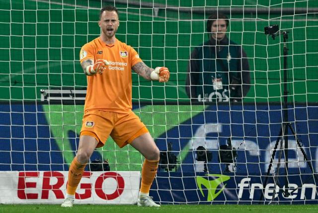 Bayer Leverkusen's Dutch goalkeeper #01 Mark Flekken reacts during the German Cup (DFB-Pokal) semi-final football match between Bayer 04 Leverkusen and FC Bayern Munich in Leverkusen, western Germany on April 22, 2026. (Photo by INA FASSBENDER / AFP) / DFB REGULATIONS PROHIBIT ANY USE OF PHOTOGRAPHS AS IMAGE SEQUENCES AND QUASI-VIDEO.