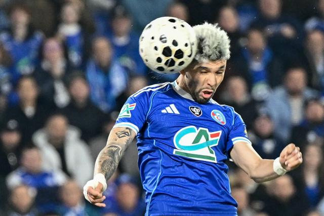 Strasbourg's Paraguayan midfielder #19 Julio Enciso heads the ball towards goal during the French Cup semi-final football match between RC Strasbourg Alsace and OGC Nice at the Stade de la Meinau in Strasbourg, eastern France, on April 22, 2026. (Photo by SEBASTIEN BOZON / AFP)