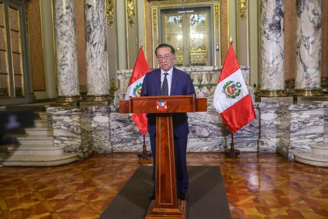 This handout picture released by the Peruvian Presidency shows Peru's interim President Jose Maria Balcazar speaking during a message to the nation in Lima on April 22, 2026. Peru's foreign and defense ministers resigned on April 22, 2026, in protest over the interim president's decision to stall a $3.5 billion deal for the purchase of 24 US F-16 fighter jets. (Photo by Handout / PRESIDENCIA DEL PERU / AFP)