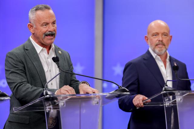 (L/R) Republican candidate Chad Bianco and Republican candidate Steve Hilton participate in a California gubernatorial debate at the studios of KRON4 in San Francisco, on April 22, 2026. The six leading candidates for California governor are participating in the first major televised debate, ahead of the June 2 primary elections. (Photo by Jason Henry / POOL / AFP)