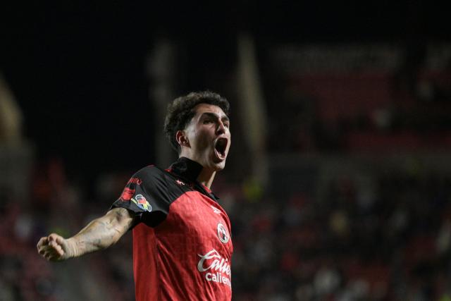 Tijuana's forward #31 Diego Abreu celebrates scoring his team's second goal during a Mexican League football match between Tijuana and Pachuca at Caliente stadium in Tijuana, Mexico, on April 22, 2026. (Photo by Guillermo ARIAS / AFP)