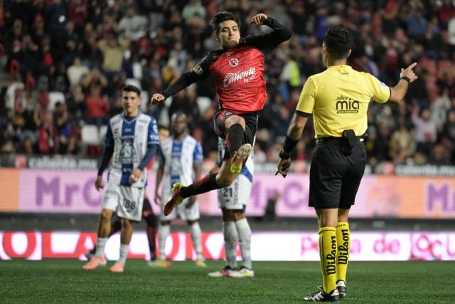 Tijuana's midfielder #19 Gilberto Mora celebrates scoring his team's first goal during a Mexican League football match between Tijuana and Pachuca at Caliente stadium in Tijuana, Mexico, on April 22, 2026. (Photo by Guillermo ARIAS / AFP)