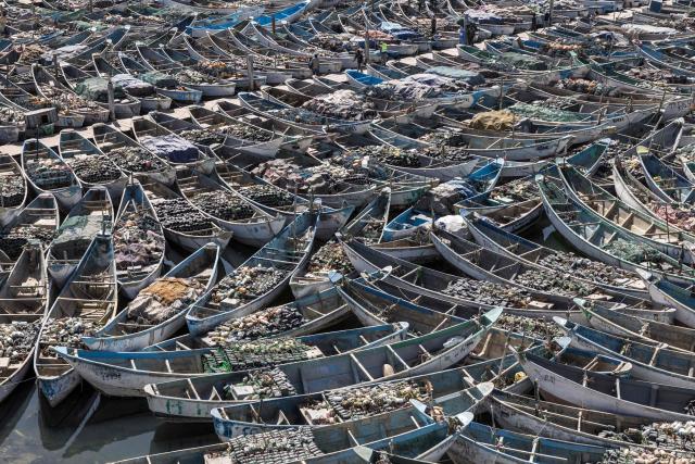 A general view of pirogues docked at the Port Artisanal in Nouadhibou, on April 22, 2026. (Photo by PATRICK MEINHARDT / AFP)