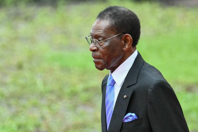Equatorial Guinea's President Teodoro Obiang Nguema Mbasogo arrives ahead of Pope Leo XIV leading a Holy Mass at the Malabo Stadium in Malabo on the last day of an 11-day apostolic journey to Africa, on April 23, 2026. (Photo by Alberto PIZZOLI / AFP)