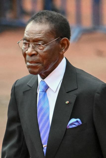 Equatorial Guinea's President Teodoro Obiang Nguema Mbasogo arrives ahead of Pope Leo XIV leading a Holy Mass at the Malabo Stadium in Malabo on the last day of an 11-day apostolic journey to Africa, on April 23, 2026. (Photo by Alberto PIZZOLI / AFP)