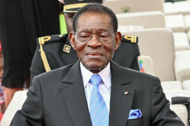 Equatorial Guinea's President Teodoro Obiang Nguema Mbasogo attends a Holy Mass lead by Pope Leo XIV at the Malabo Stadium in Malabo on the last day of an 11-day apostolic journey to Africa, on April 23, 2026. (Photo by Alberto PIZZOLI / AFP)