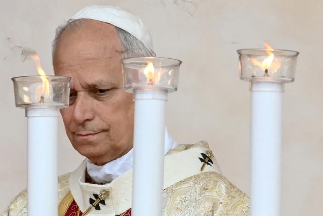 Pope Leo XIV leads a Holy Mass at the Malabo Stadium in Malabo on the last day of an 11-day apostolic journey to Africa, on April 23, 2026. (Photo by Alberto PIZZOLI / AFP)