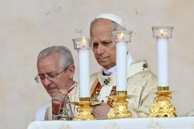 Pope Leo XIV leads a Holy Mass at the Malabo Stadium in Malabo on the last day of an 11-day apostolic journey to Africa, on April 23, 2026. (Photo by Alberto PIZZOLI / AFP)