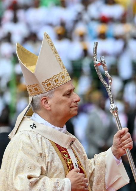Pope Leo XIV arrives to lead a Holy Mass at the Malabo Stadium in Malabo on the last day of an 11-day apostolic journey to Africa, on April 23, 2026. (Photo by Alberto PIZZOLI / AFP)