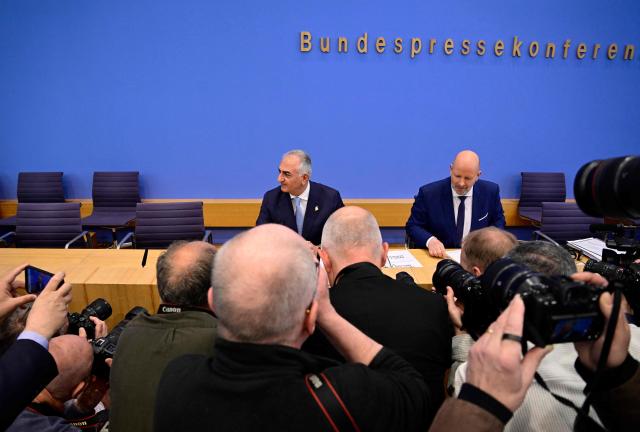 The son of Iran's last shah, exiled Crown Prince Reza Pahlavi arrives for a press conference at the BPK (Bundespressekonferenz) building in Berlin, on April 23, 2026. (Photo by John MACDOUGALL / AFP)