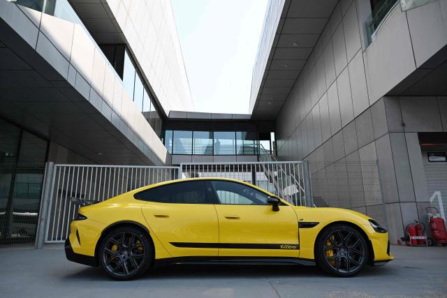 A Xiaomi SU7 Ultra is seen in the pit lane during a Xiaomi track day driving experience in Tianjin, in northern China on April 23, 2026, ahead of the Beijing Auto Show which opens on April 24. (Photo by GREG BAKER / AFP)