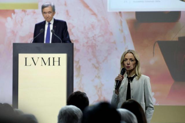 LVMH chairman and CEO Bernard Arnault (L) listens to his daughter Delphine Arnault, Chairman and CEO of Christian Dior Couture and a member of LVMH Board of Directors and of the Executive Committee, during the annual general meeting of the world's leading luxury group LVMH at the Carrousel du Louvre in Paris on April 23, 2026. (Photo by Ludovic MARIN / AFP)