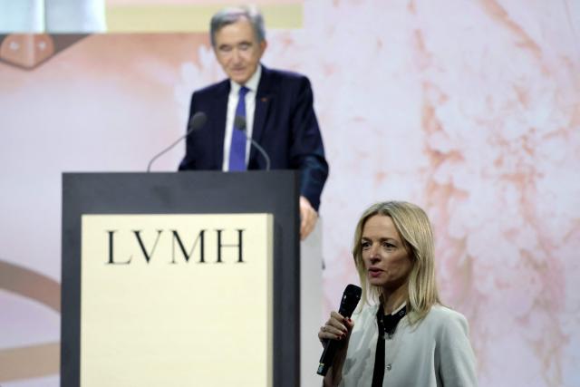 LVMH chairman and CEO Bernard Arnault (L) listens to his daughter Delphine Arnault, Chairman and CEO of Christian Dior Couture and a member of LVMH Board of Directors and of the Executive Committee, during the annual general meeting of the world's leading luxury group LVMH at the Carrousel du Louvre in Paris on April 23, 2026. (Photo by Ludovic MARIN / AFP)