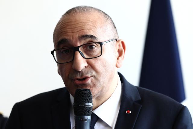 France's Interior Minister Laurent Nunez delivers a speech prior to renew the Sandhurst treaty at the Border Police office of Loon-Plage, near Dunkirk, on April 23, 2026. Britain and France have agreed a new three-year deal to stop undocumented migrants making the risky journey across the Channel in small boats, the two sides announced. Under the deal, France pledged to increase law enforcement on the coast by more than half to fight irregular migration to Britain -- reaching 1,400 officers by 2029. The Sandhurst treaty sets out the UK's financial contribution to French efforts to stop migrants attempting the perilous sea crossing to Britain. (Photo by Sameer AL-DOUMY / AFP)