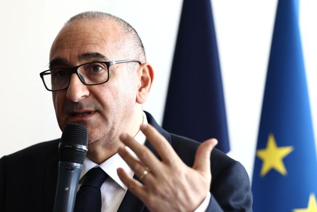 France's Interior Minister Laurent Nunez delivers a speech prior to renew the Sandhurst treaty at the Border Police office of Loon-Plage, near Dunkirk, on April 23, 2026. Britain and France have agreed a new three-year deal to stop undocumented migrants making the risky journey across the Channel in small boats, the two sides announced. Under the deal, France pledged to increase law enforcement on the coast by more than half to fight irregular migration to Britain -- reaching 1,400 officers by 2029. The Sandhurst treaty sets out the UK's financial contribution to French efforts to stop migrants attempting the perilous sea crossing to Britain. (Photo by Sameer AL-DOUMY / AFP)