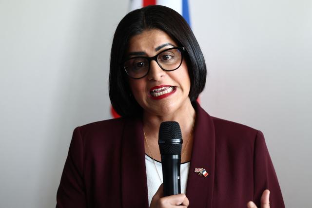 British Home Secretary Shabana Mahmood delivers a speech prior to renew the Sandhurst treaty at the Border Police office of Loon-Plage, near Dunkirk, on April 23, 2026. Britain and France have agreed a new three-year deal to stop undocumented migrants making the risky journey across the Channel in small boats, the two sides announced. Under the deal, France pledged to increase law enforcement on the coast by more than half to fight irregular migration to Britain -- reaching 1,400 officers by 2029. The Sandhurst treaty sets out the UK's financial contribution to French efforts to stop migrants attempting the perilous sea crossing to Britain. (Photo by Sameer AL-DOUMY / AFP)