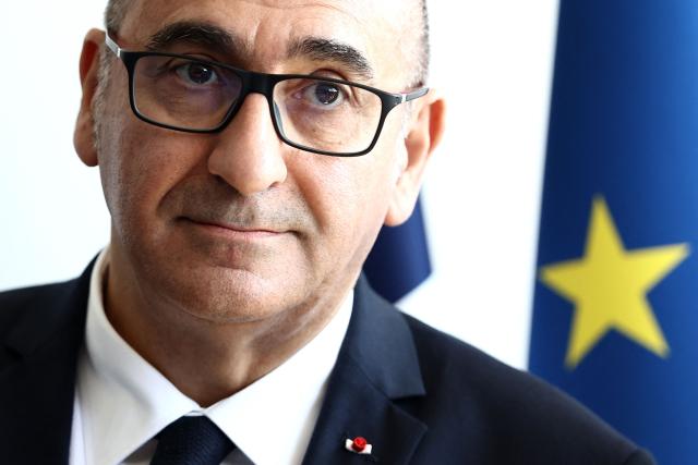France's Interior Minister Laurent Nunez looks on prior to renew the Sandhurst treaty with British Home Secretary at the Border Police office of Loon-Plage, near Dunkirk, on April 23, 2026. Britain and France have agreed a new three-year deal to stop undocumented migrants making the risky journey across the Channel in small boats, the two sides announced. Under the deal, France pledged to increase law enforcement on the coast by more than half to fight irregular migration to Britain -- reaching 1,400 officers by 2029. The Sandhurst treaty sets out the UK's financial contribution to French efforts to stop migrants attempting the perilous sea crossing to Britain. (Photo by Sameer AL-DOUMY / AFP)
