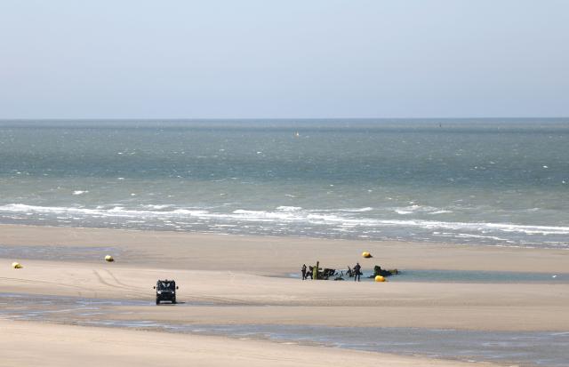 A French National Police buggy is seen on the beach during a presentation of the operational resources used to counter illegal immigration, on the shores of Zuydcoote, near Dunkirk, on April 23, 2026. Britain and France have agreed a new three-year deal to stop undocumented migrants making the risky journey across the Channel in small boats, the two sides announced. Under the deal, France pledged to increase law enforcement on the coast by more than half to fight irregular migration to Britain -- reaching 1,400 officers by 2029. The Sandhurst treaty sets out the UK's financial contribution to French efforts to stop migrants attempting the perilous sea crossing to Britain. (Photo by Sameer AL-DOUMY / AFP)