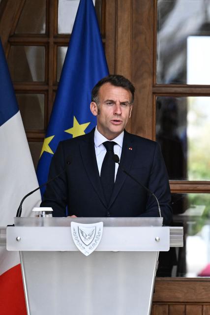 France's President Emmanuel Macron delivers statements after a meeting with his Cypriot counterpart at the Presidential Palace in Nicosia on April 23, 2026, on the sidelines of a European summit. (Photo by Jewel SAMAD / AFP)