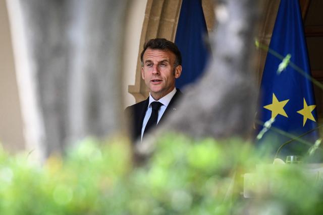 France's President Emmanuel Macron looks on as he delivers statements after a meeting with his Cypriot counterpart at the Presidential Palace in Nicosia on April 23, 2026, on the sidelines of a European summit. (Photo by Jewel SAMAD / AFP)