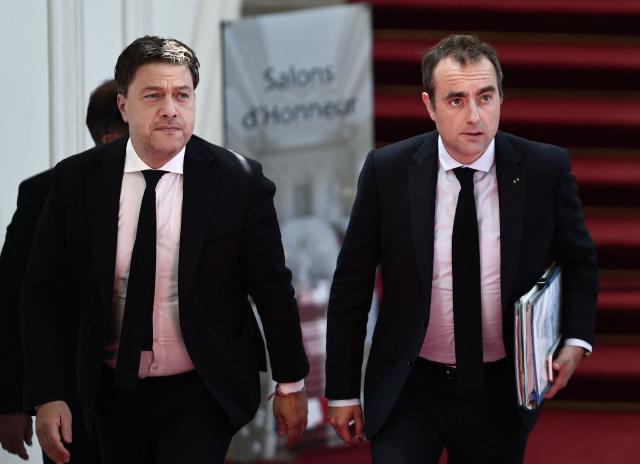 France's Prime Minister Sebastien Lecornu (C) arrives with Mayor of Marseille Benoit Payan (L) at the Prefecture of the Bouches-du-Rhône for an official visit and a meeting of the National Steering Committee for Housing in Marseille on April 23, 2026. (Photo by Thibaud MORITZ / AFP)