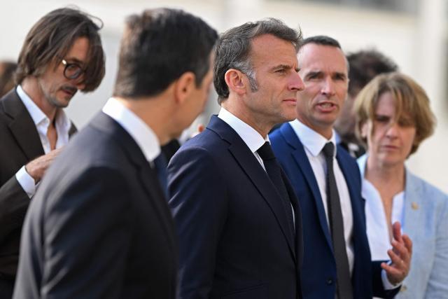 France's President Emmanuel Macron (3R) visits the French School in Nicosia on April 23, 2026, ahead of a meeting on the sidelines of a European summit. (Photo by Jewel SAMAD / AFP)