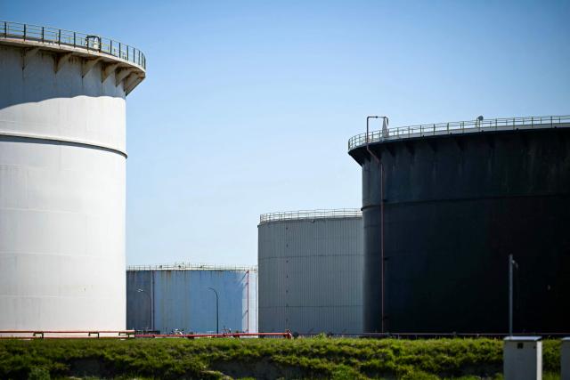 This photograph shows tanks at the TotalEnergies refinery platform in Gronfreville-L’Orcher, near Le Havre, northwestern France, on April 23, 2026. (Photo by Lou BENOIST / AFP)