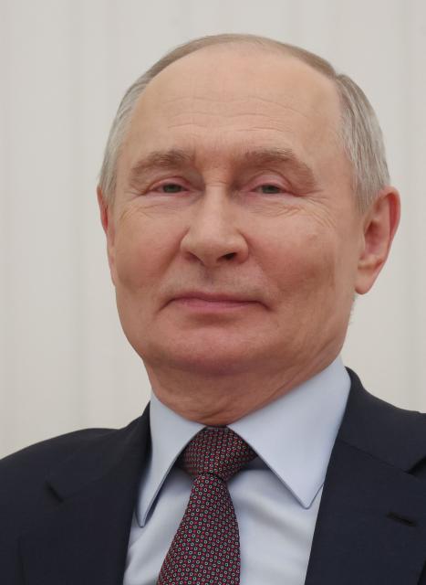 Russian President Vladimir Putin attends a meeting with Kyrgyzstan's President at the Kremlin in Moscow on April 23, 2026. (Photo by MAXIM SHIPENKOV / POOL / AFP)