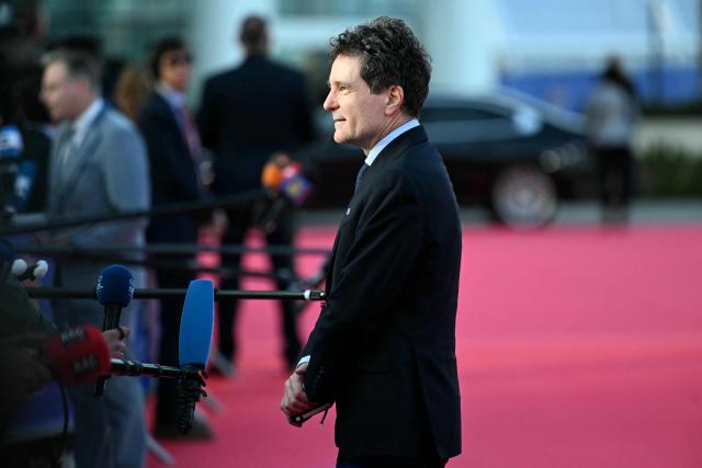 Romania's President Nicusor Dan speaks to the media upon his arrival ahead of an informal meeting of the European Council, in Ayia Napa on April 23, 2026. (Photo by NICOLAS TUCAT / AFP)