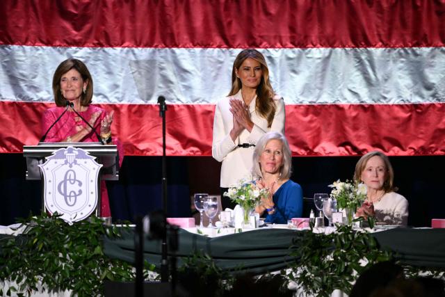 US First Lady Melania Trump (C) applauds as she attends the 113th Annual First Lady's Luncheon at the Washington Hilton in Washington, DC, on April 23, 2026. (Photo by Mandel NGAN / AFP)