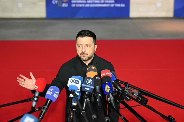 Ukraine's President Volodymyr Zelensky speaks to media upon his arrival ahead of an informal meeting of the European Council, in Ayia Napa on April 23, 2026. (Photo by NICOLAS TUCAT / AFP)