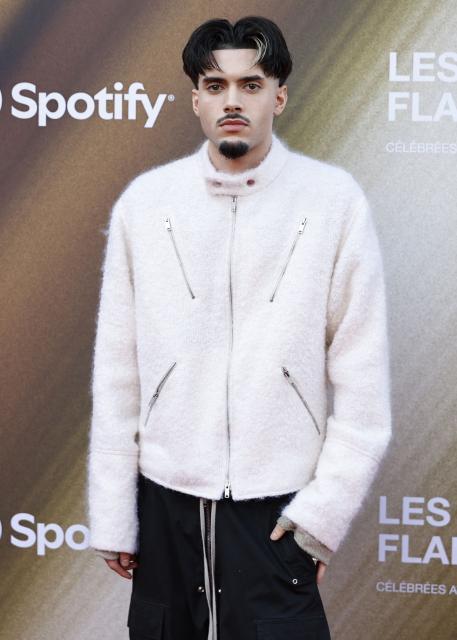 French rapper and artist RnBoi poses for a photocall upon arrival for the fourth edition of "Les Flammes" music award ceremony at the Seine Musicale, in Boulogne-Billancourt, in the western outskirts of Paris on April 23, 2026. (Photo by SIMON WOHLFAHRT / AFP)