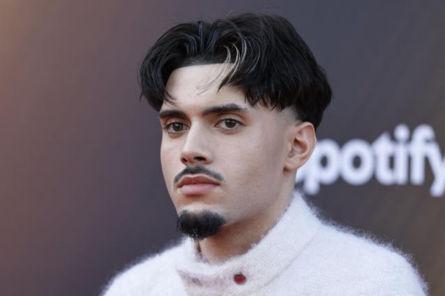 French rapper and artist RnBoi poses for a photocall upon arrival for the fourth edition of "Les Flammes" music award ceremony at the Seine Musicale, in Boulogne-Billancourt, in the western outskirts of Paris on April 23, 2026. (Photo by SIMON WOHLFAHRT / AFP)
