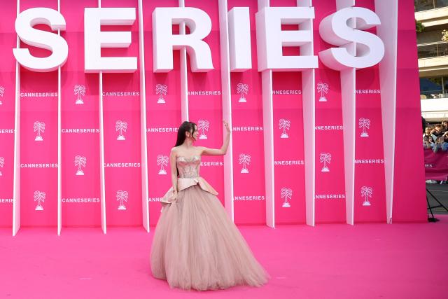 South-Korean singer Jisoo poses on the pink carpet during the opening of the 9th edition of the Cannes International Series Festival (Canneseries) in Cannes, southern France, on April 23, 2026.  (Photo by Valery HACHE / AFP)