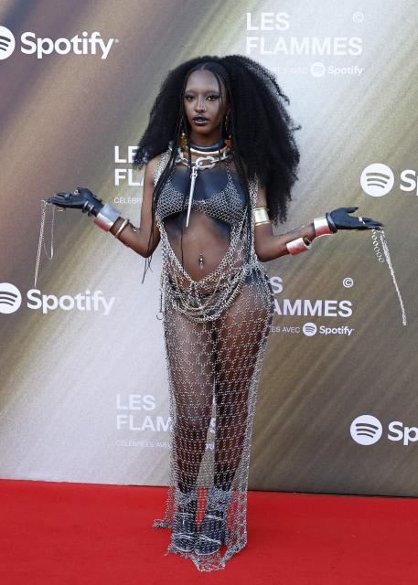 French singer Ebony poses for a photocall upon arrival for the fourth edition of "Les Flammes" music award ceremony at the Seine Musicale, in Boulogne-Billancourt, in the western outskirts of Paris on April 23, 2026. (Photo by SIMON WOHLFAHRT / AFP)