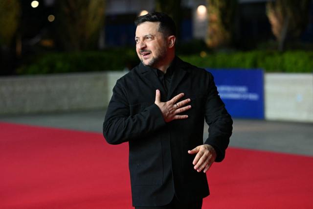 Ukraine's President Volodymyr Zelensky walks upon his arrival ahead of an informal meeting of the European Council, in Ayia Napa on April 23, 2026. (Photo by NICOLAS TUCAT / AFP)