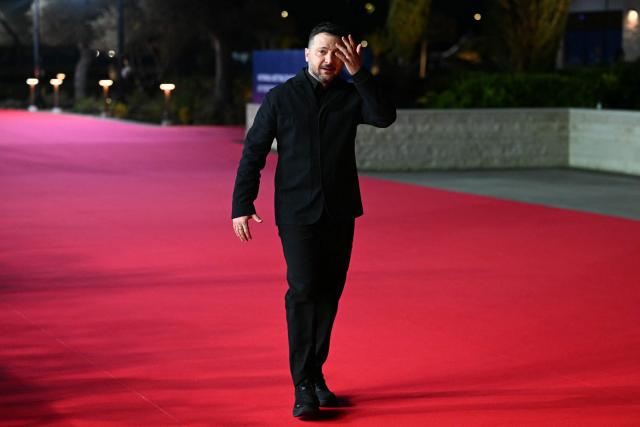 Ukraine's President Volodymyr Zelensky walks upon his arrival ahead of an informal meeting of the European Council, in Ayia Napa on April 23, 2026. (Photo by NICOLAS TUCAT / AFP)