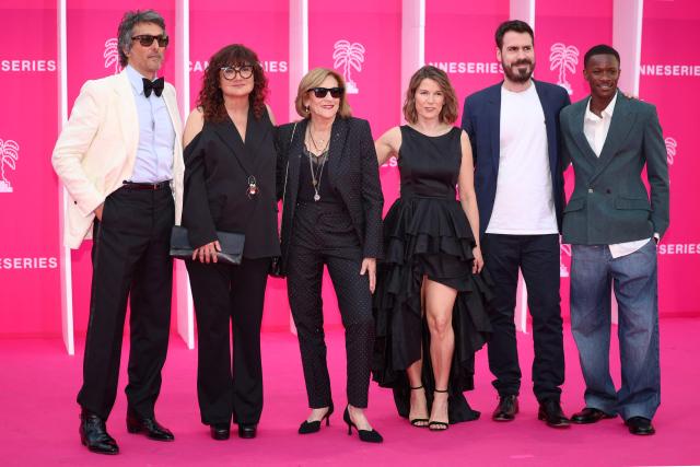 (From L) Members of the jury French actor Vincent Elbaz, Spanish film director Isabel Coixet, US film director Lesli Linka Glatter, British film score composer Ruth Barrett, French actor and director Simon Astier and French actor Mamadou Sidibe pose on the pink carpet during the opening of the 9th edition of the Cannes International Series Festival (Canneseries) in Cannes, southern France, on April 23, 2026.  (Photo by Valery HACHE / AFP)