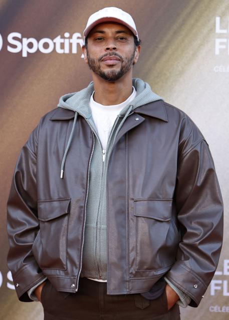 French rapper Disiz poses for a photocall upon arrival for the fourth edition of "Les Flammes" music award ceremony at the Seine Musicale, in Boulogne-Billancourt, in the western outskirts of Paris on April 23, 2026. (Photo by SIMON WOHLFAHRT / AFP)
