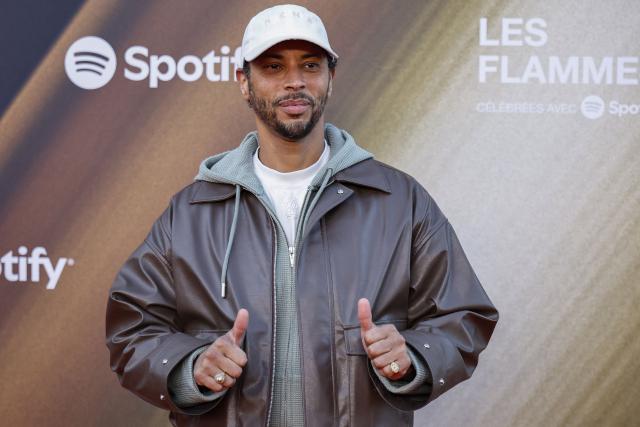 French rapper Disiz poses for a photocall upon arrival for the fourth edition of "Les Flammes" music award ceremony at the Seine Musicale, in Boulogne-Billancourt, in the western outskirts of Paris on April 23, 2026. (Photo by SIMON WOHLFAHRT / AFP)