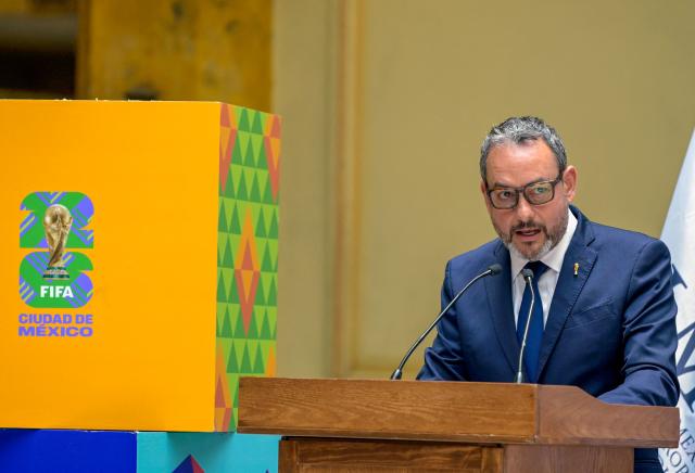 Jurgen Mainka, Chief Tournament Officer for the FIFA World Cup 2026 in Mexico, speaks during the symbolic delivery of famous brands, FIFA and FIFA World Cup Trophy in Mexico City on April 23, 2026. The Mexican Institute of Industrial Property (IMPI) has carried out operations against counterfeit FIFA merchandise and World Cup trophies to protect both brands ahead of the start of the World Cup on June 11, 2026. (Photo by Alfredo ESTRELLA / AFP)