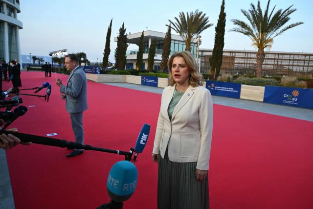 Latvia's Prime Minister Evika Silina (R) and her Belgium's counterpart Bart De Wever speak to the media upon their arrival ahead of an informal meeting of the European Council, in Ayia Napa on April 23, 2026. (Photo by NICOLAS TUCAT / AFP)