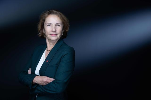 Chairwoman and Chief Executive Officer of La Poste Groupe Marie-Ange Debon poses during a photo session in Paris on April 23, 2026. (Photo by JOEL SAGET / AFP)